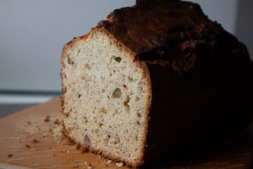 Fresh baked loaf of banana bread on a cutting board