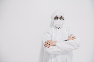 Fototapeta na wymiar doctor with mask and security suit , covid , on a side 