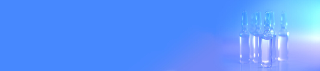 Medicine and Pharmacology.Biotechnology and Science.Glass transparent ampoules set in light blue and purple tones.Ampoules with solution for injection.Health and beauty. natural cosmetics.bunner