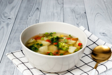 Colorful fresh clear spring soup - vegetarian stock