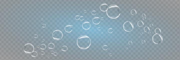 Set of realistic colorful soap bubbles. Transparent realistic soap bubbles isolated on transparent background.