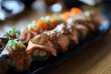 Overhead japanese sushi food. Top view of assorted sushi. Rainbow sushi roll.