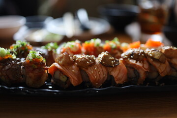 Overhead japanese sushi food. Top view of assorted sushi. Rainbow sushi roll.
