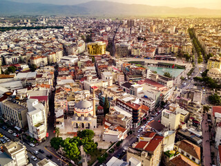 Aerial photograph of the capital of Aydin province - Aydin city from high point of drone fly in sunny day in Turkey. Amazing aerial cityscape view from birds fly altitude on beautiful city centre and 