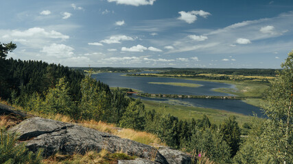 Fototapeta na wymiar View from the mountain of Karelia panorama of Paaso Karelian settlement beauty of nature forests