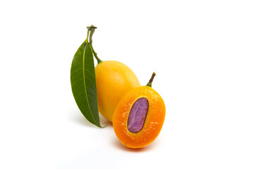 Sweet Yellow Marian plum with leaves