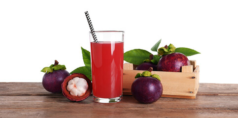 Delicious mangosteen juice and fresh fruits on wooden table against white background