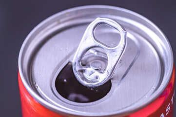 Bratislava, Slovakia, 20.3.2020. A can, tin of fresh Coca Cola drink with brick wall backround....