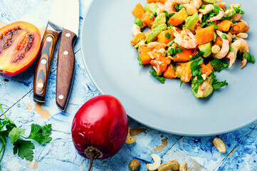 Exotic salad with tamarillo and prawn