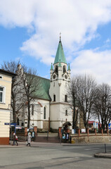 Obraz premium BRZESKO, POLAND - MARCH 10, 2021: Church at the old town
