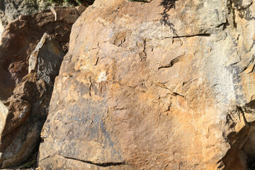 Rock background. Cracked structure, abstract motif.