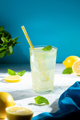 Fototapeta premium Glass of fresh homemade tasty lemonade with copyspace. Vertical format.