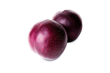 Two ripe purple plums isolated on white.