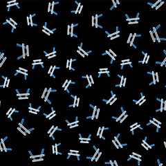Line Picnic table with benches on either side of the table icon isolated seamless pattern on black background. Vector