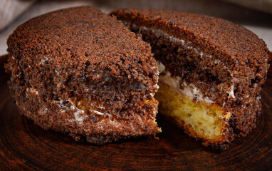 tiramisu cake is cut in half.