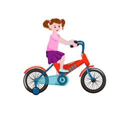 Fototapeta na wymiar Happy cute little girl riding a bike