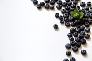 Fresh juicy blueberries background. Flat lay top view copy space. Healthy berry, organic food, antioxidant, vitamin, blue food
