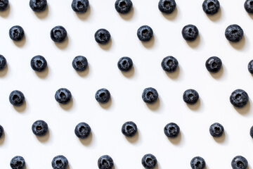 Fresh juicy blueberries background. Flat lay top view copy space. Healthy berry, organic food, antioxidant, vitamin, blue food