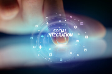 Naklejka na ściany i meble Finger touching tablet with social media icons concept