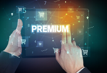 Close-up of a hand holding tablet with shopping inscription