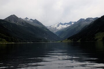 Obraz premium lake in snowy alps mountains