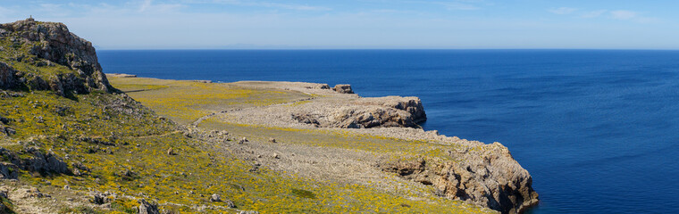 Panoramic view of the west coast of Menorca in a sunny day with blue sky (Balearic Islands, Spain)