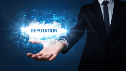 Hand of Businessman holding motivational message