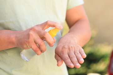 hand disinfection with an antiseptic spray as prevention of coronavirus - Image