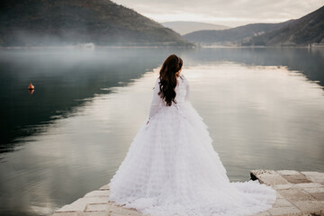 bride and groom wedding day by the sea