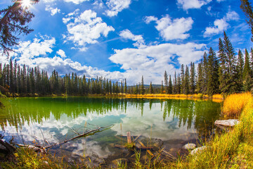 Round small lake with cold water