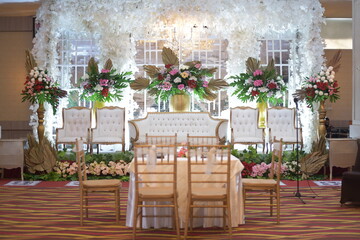 Indoors wedding reception venue with beautiful decoration, be a witness to an eternal marriage.
