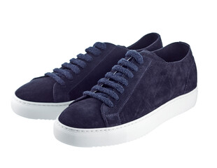 Beautiful pair of elegant shoes made of dark blue suede with laces and white soles isolated on a white background. Trends of the season: comfortable shoes made of natural materials.