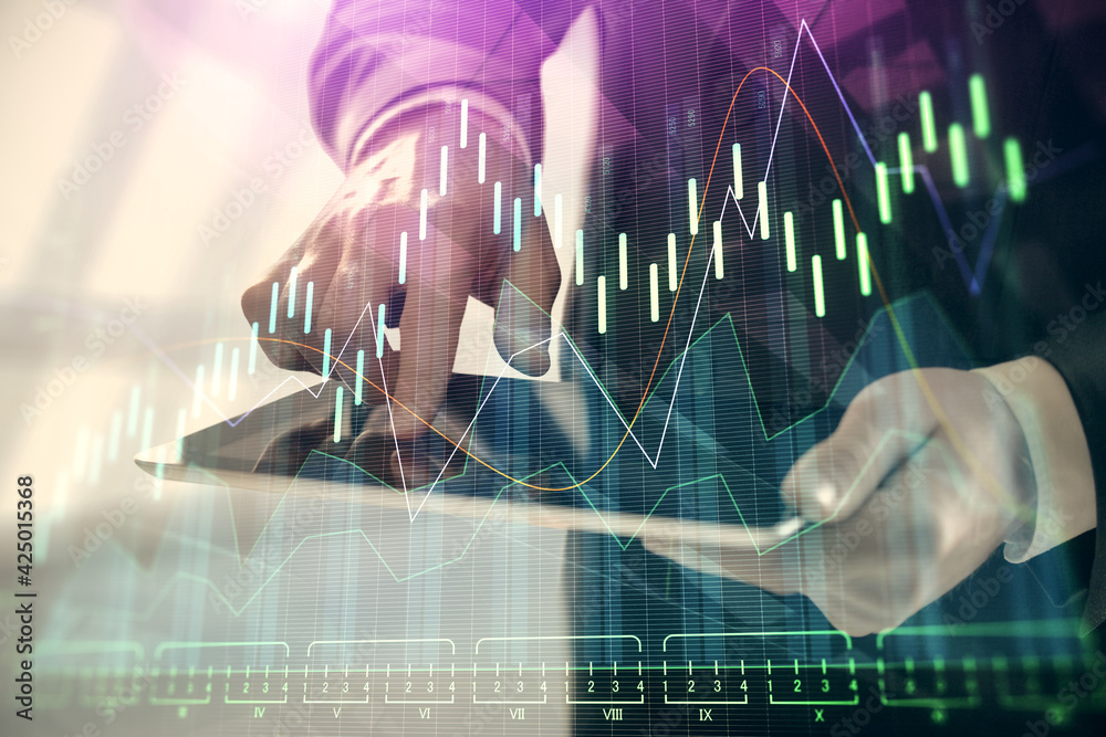 Poster double exposure of man's hands holding and using a digital device and forex graph drawing. financial