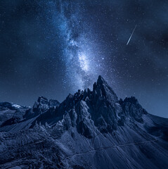 Milky way over Monte Paterno, Dolomites. Mountain hiking at night.