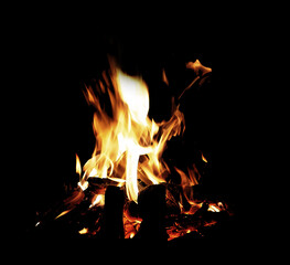 Bonfire winter dark night, view from top. Flame sores rise into lens. Roast oneself at fire on...
