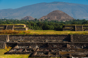 view of old antique ruins and maya pyramids under mountain 