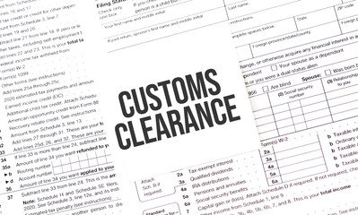 Yellow Paper Note With Words CUSTOMS CLEARANCE , Tax concept