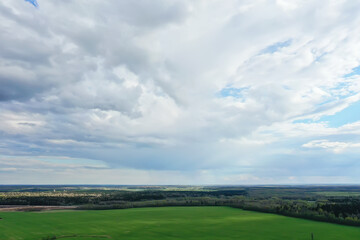 Obraz premium early spring field top view drone, abstract landscape flight