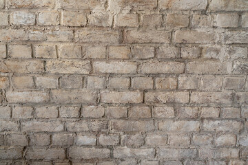 old gray brick wall. stone background