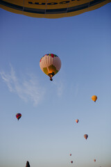 Huge balloons in the panorama of Cappadocia.