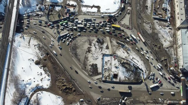 a large transport ring frozen in a traffic jam, filmed from a height on a drone 