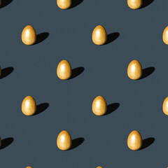 Easter seamless pattern. Yellow Golden shiny Easter eggs on grey background. Trendy colors Easter composition. Minimal Easter concept.