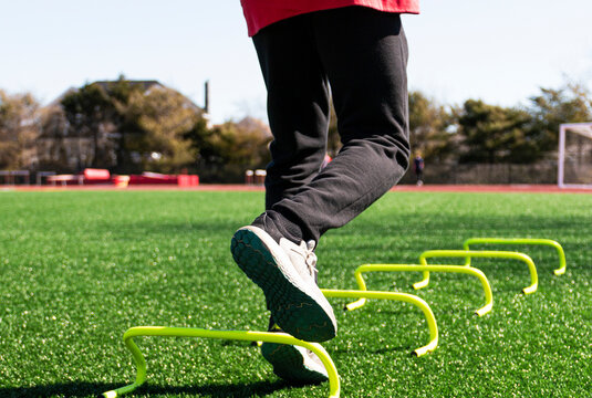 Hopping Over Mini Hurdles On One Leg