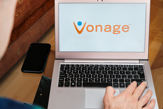 Vonage is used for business meeting on laptop by man. An illustrative editorial image. San Francisco, US, June 2020.