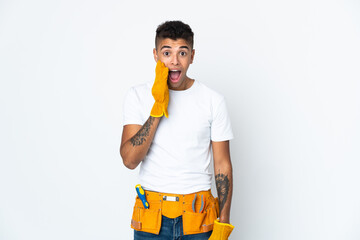 Young Brazilian electrician manipulated isolated on white background with surprise and shocked facial expression