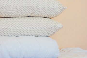 pillows and blanket on the bed. pillows, blanket, bedroom, sleeping accessories