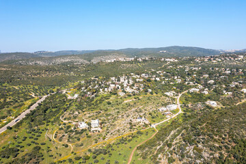 Fototapeta na wymiar Ein Hod Artist hillside village houses, Aerial view.