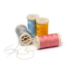 Colorful spools of yarn isolated on white background 