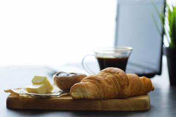 Fresh pastries on the table. French flavored croissant.