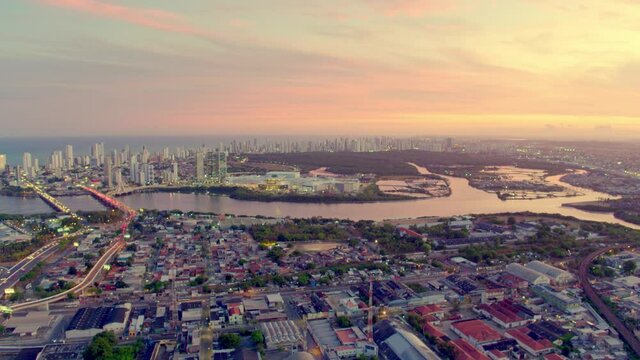 19 AERIAL IMAGE OF THE CAPIBARIBE RIVER, MANGROVES AND BRIDGES OF THE CITY OF RECIFE, PERNAMBUCO, BRAZIL, WITH THE SUNSET LIGHT AT DUSK
